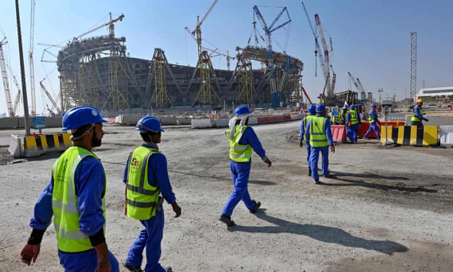 Construction workers outside Lusail Stadium.