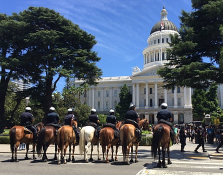 Sacramento mounted police keep watch over a protest in Sacramento in June 2016.