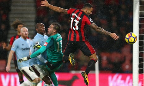 Callum Wilson converts Bournemouth’s stoppage-time equaliser, which the referee decided did not involve a handball.