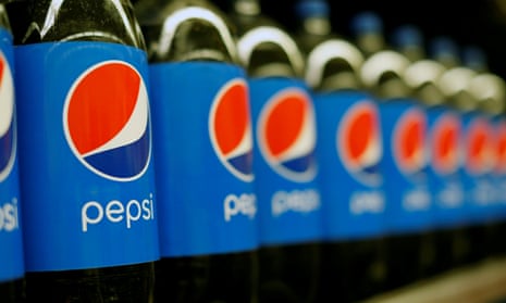 Row of Pepsi bottles on shelf