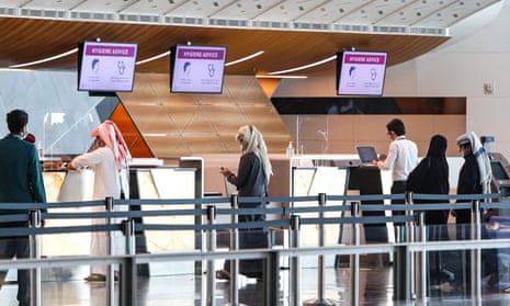 Travellers at the Qatar Airways check-in desk at Doha’s Hamad international airport in January