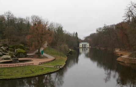 A pavilion and wooded paths surround part of a lake in Sofiyivka Park