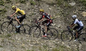 Chris Froome, wearing the overall leader’s yellow jersey, Tejay Van Garderen, and Nairo Quintana, wearing the best young’s white jersey, make their way up an incline