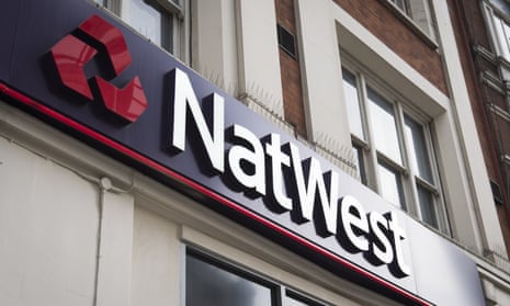A NatWest sign is seen outside a branch of the bank