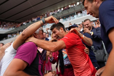 Serbia's Novak Djokovic celebrates winning the men's singles final.