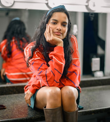 Abby Govindan sits in a dressing room