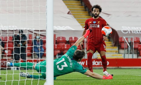 Crystal Palace keeper Wayne Hennessey saves from Liverpool’s Mohamed Salah.