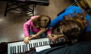 Child plays piano