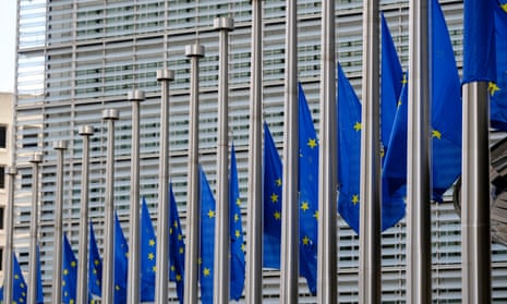 EU flags fly at half-mast, in respect of the flood victims in Valencia (Spain) in front of the Berlaymont, the EU Commission headquarters on October 30, 2024 in Brussels, Belgium