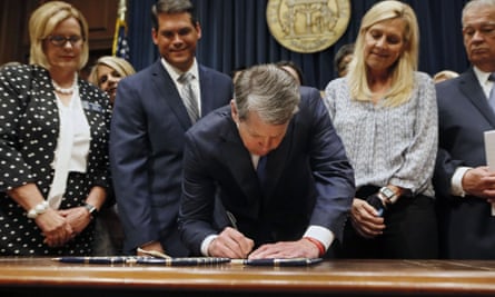 The Goergia governor, Brian Kemp, signs legislation banning abortions once a fetal heartbeat can be detected, which can be as early as six weeks before many women know they’re pregnant.