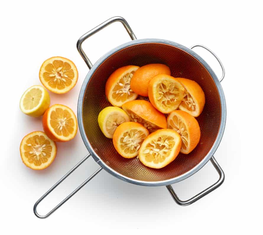 Halve the oranges, squeeze the juice in to a pan, collect the pips.