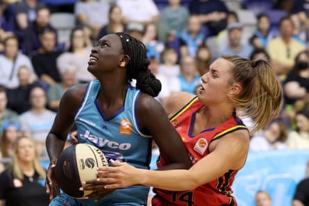Nyadiew Puoch and Isobel Borlase play against each other in the WNBL