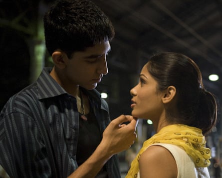 Dev Patel and Freida Pinto about to kiss