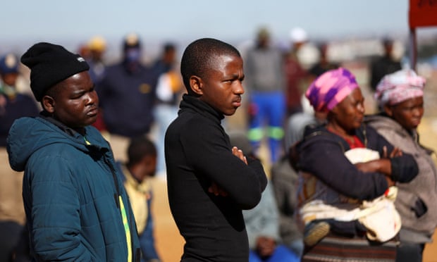 Residents gather in Nomzamo near Soweto, to listen to Police Minister Bheki Cele, after 15 people were killed by gunmen in a bar.