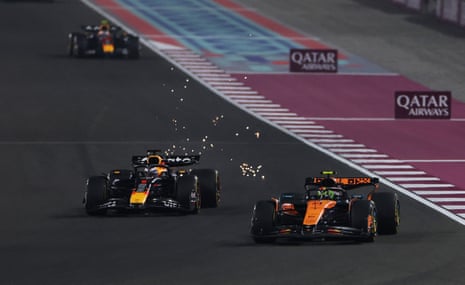 McLaren's Lando Norris holds off Red Bull's Max Verstappen.