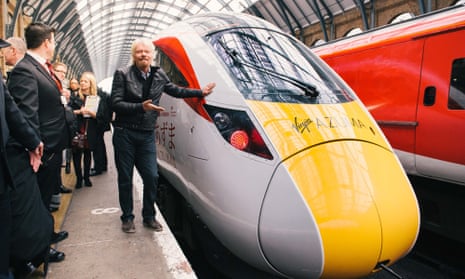 Sir Richard Branson unveiling the Virgin Azuma, a faster train on the East Coast Main Line, at King’s Cross station in London in March 2016. 