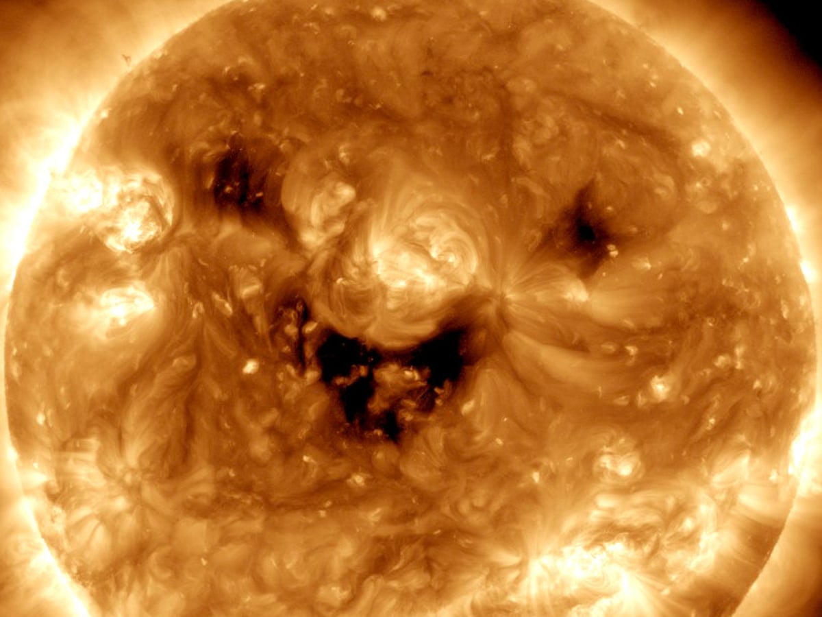 Ray Of Joy Nasa Captures Image Of The Sun Smiling The Sun The Guardian Ray Of Joy Nasa Captures Image Of The Sun Smiling The Sun The Guardian