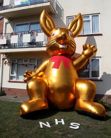 A giant inflatable Easter bunny and messages of support for the NHS are seen at Belle Vue Mansions in Southbourne, Dorset.