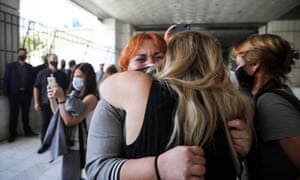 Irini Fyssa, the sister of the Greek rapper Pavlos Fyssas, who was killed in 2013 by a Golden Dawn supporter, reacts after the verdict