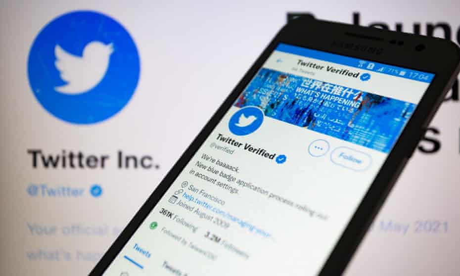 A Twitter verified account displayed on a smartphone