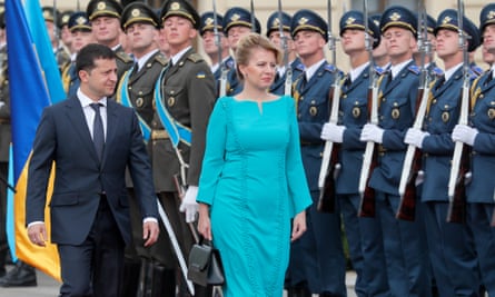 The Ukrainian president, Volodymyr Zelenskiy, reviews the guard of honour with his Slovak counterpart Zuzana Caputova at the Mariinskiy Palace in Kiev, Ukraine.
