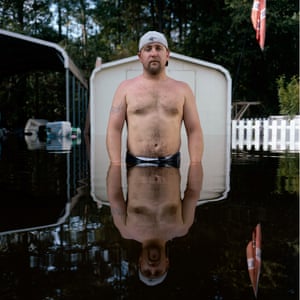 David Morris, in Andrews South Carolina USA outside flooded home
