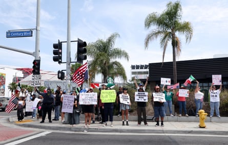 Protesters stage a demonstration close to the stadium ahead of the Gold Cup match on Saturday between Mexico and the Dominican Republic in Inglewood, California.