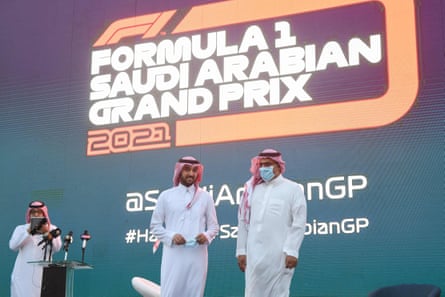 Saudi sports minister Prince Abdulaziz bin Turki (centre) and Khalid al-Faisal, chairman of the Saudi Automobile and Motorcycle Federation, are pictured on stage during a press conference to announce the Saudi Arabian Grand Prix as part of the 2021 F1 calendar.