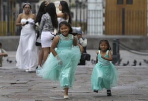 Lima, Peru: Two girls run