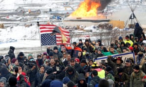 Opponents of the Dakota Access oil pipeline march out of their main camp near Cannon Ball, North Dakota, in February 2017.