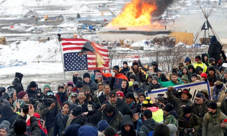 Opponents of the Dakota Access oil pipeline march out of their main camp near Cannon Ball, North Dakota, in February 2017.