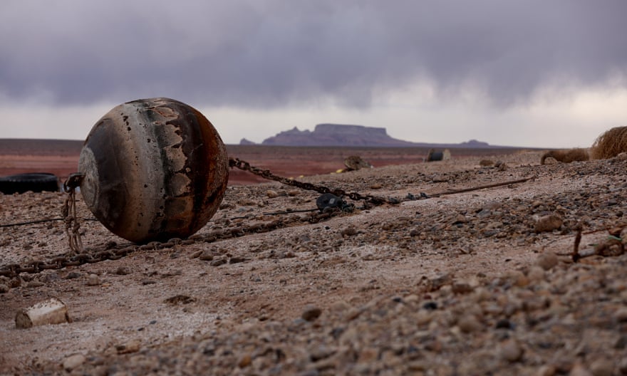 A buoy sits on the beach near the Wahweap Marina at Lake Powell in Page, Arizona.