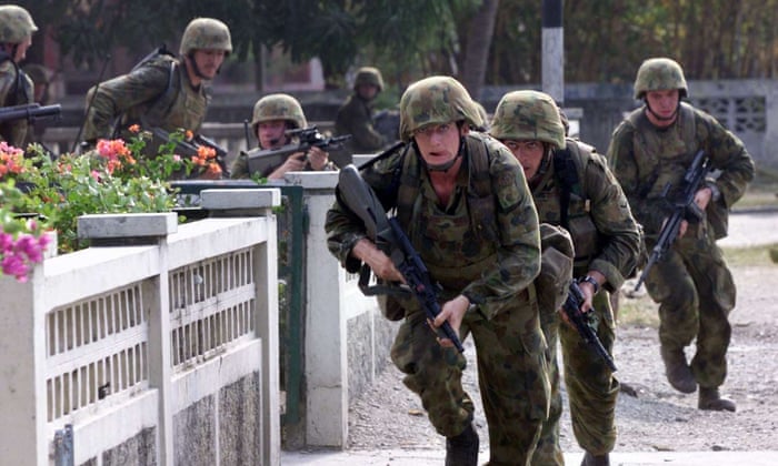 Australian peacekeeping troops in the East Timorese captial of Dili during an Australia-led mission to restore order in September 1999.
