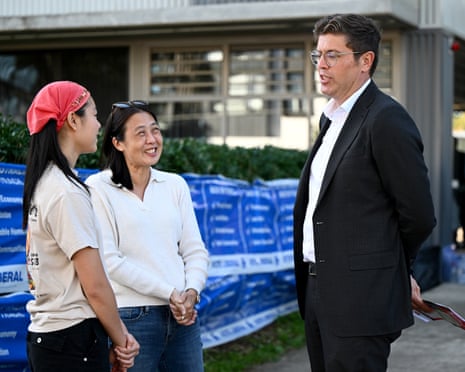 Jerome Laxale (right) speaks to voters on 2 May 2025.