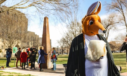 A women’s march group member dons a kangaroo mask and judicial robe onWednesday in Amarillo, Texas.