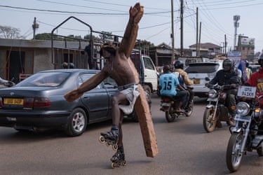 Image 10: Talasinga skates with his arms outstretched