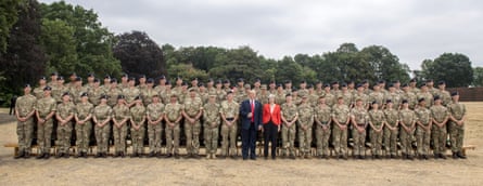 Theresa May and Donald Trump pose for a photograph at Royal Military Academy Sandhurst.