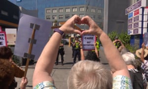 People protest in Melbourne in late February outside a hotel where refugees who have been medevaced to Australia from offshore detention are being kept held by the Australian government.