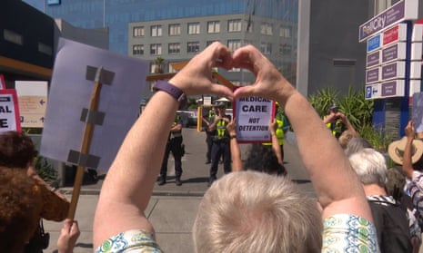 People protest in Melbourne in late February outside a hotel where refugees who have been medevaced to Australia from offshore detention are being kept held by the Australian government.