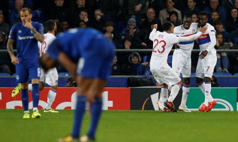 Lyon’s Bertrand Traoré celebrates what turned out to be the winner for his team as Everton players and fans alike look dejected.