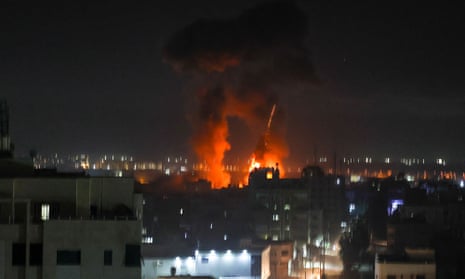Explosions light up the sky over Gaza City in the early hours of Wednesday after Israeli airstrikes.