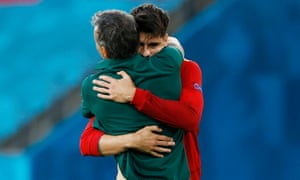 Spain’s Alvaro Morata celebrates scoring their first goal with manager Luis Enrique.