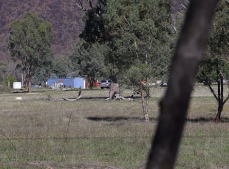 A rural property at Thologolong near Walwa, Victoria. A blue shipping container is visible in the distance.