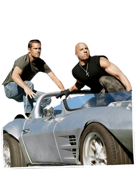 Paul Walker and Vin Diesel crouch in a beat-up sports convertible