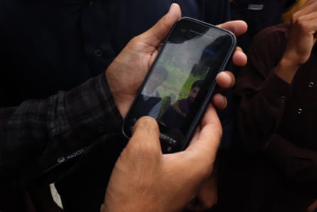 A photograph on a phone of 16-year-old Sajjad Ahmed