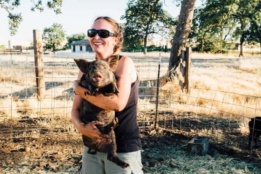 Megan Brown holds one of her sows.