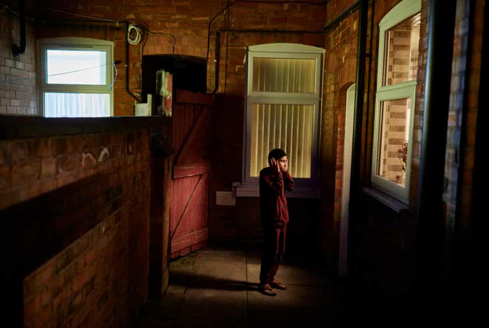 Shahmir Amir, 10, recites the adhan (the Islamic call to prayer) in his back garden in Leicester during Ramadan
