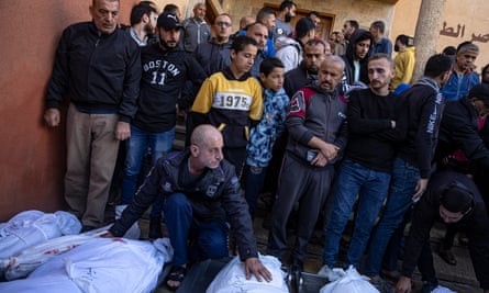 Palestinians in the hospital in Khan Younis mourn relatives killed in the Israeli bombardment of the Gaza Strip