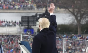 Donald Trump waves after his inaugural address.