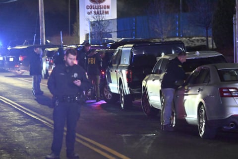 Law enforcement gathers at Extra Space Storage in Salem, New Hampshire, on 18 December after the man suspected of the Brown University mass shooting was found dead there.